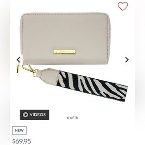 Approx. 7.25"L x 3.5"W x 3.37"H. Joy mangano leather wristlet